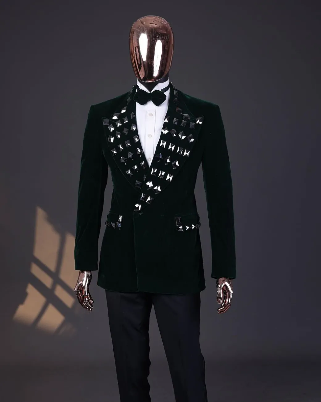A Sacramento green soaked velvet peak lapel single button double breasted suit