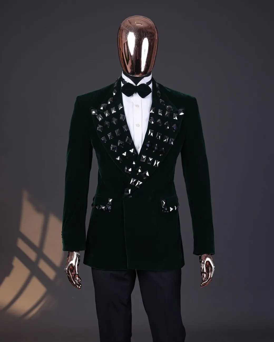 A Sacramento green soaked velvet peak lapel single button double breasted suit