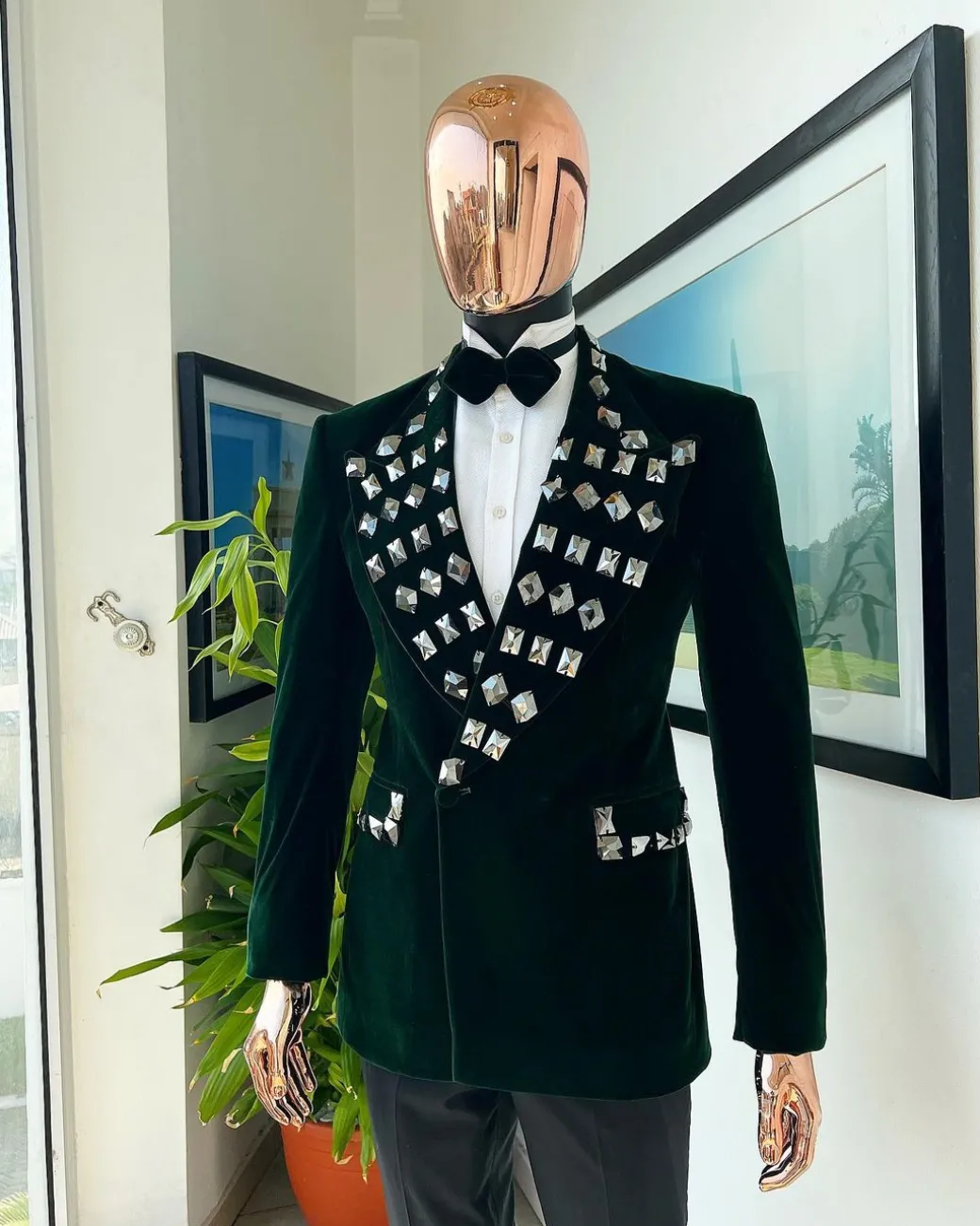A Sacramento green soaked velvet peak lapel single button double breasted suit