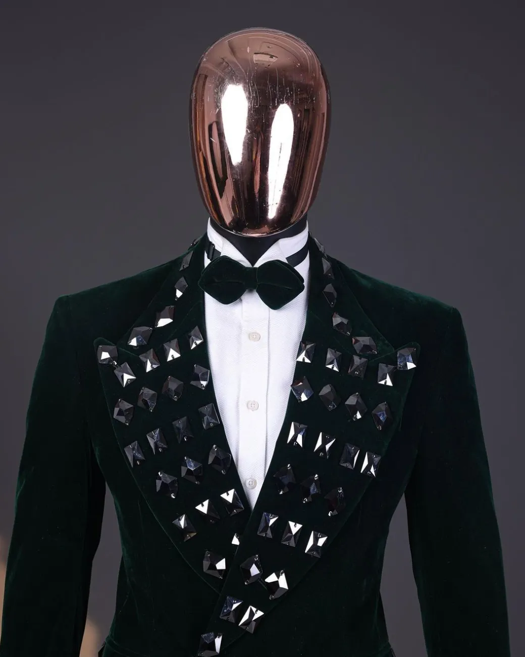 A Sacramento green soaked velvet peak lapel single button double breasted suit