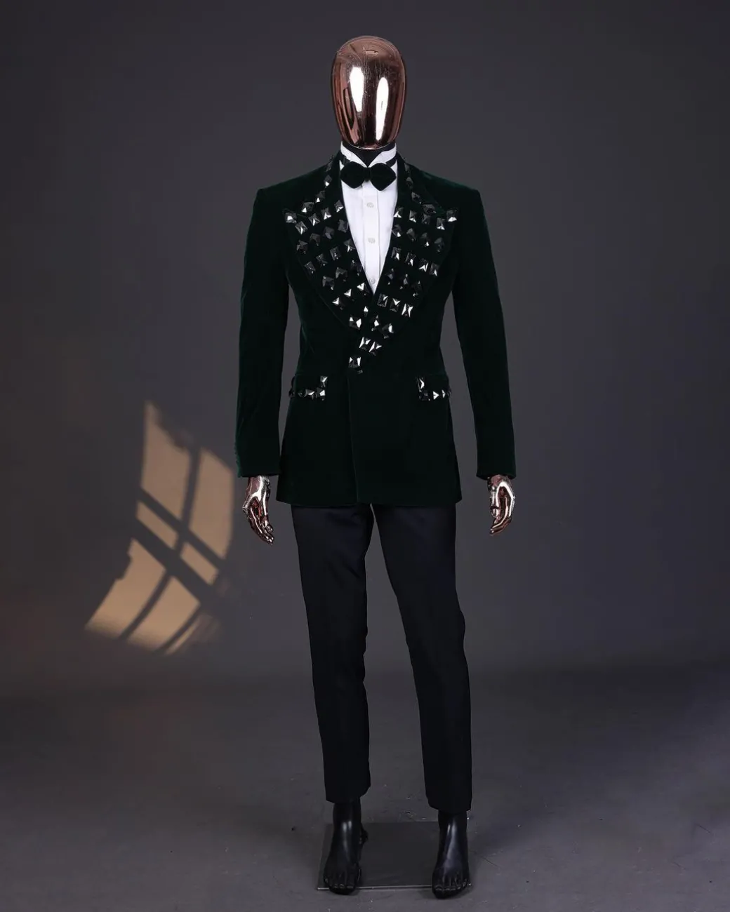 A Sacramento green soaked velvet peak lapel single button double breasted suit