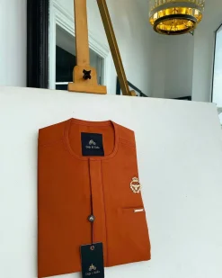 A Salamander orange, tiny flap with a gold queen bee crown details African traditional senator Kaftan native
