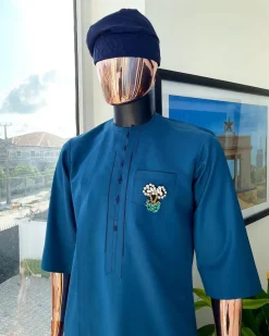 A sapphire blue, front flap, embroidery square rectangle flap and pocket design African traditional senator kaftan native.