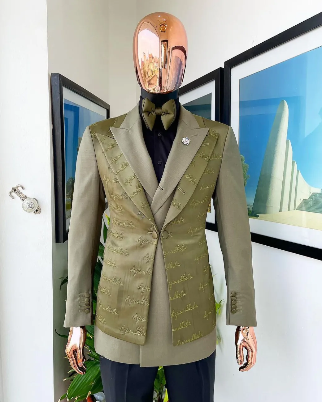 A “scritto” (inscribe your name) dark olive green, layered 4 lapel suit