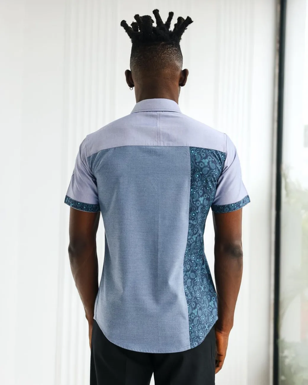 A Short sleeve, prints & plain with metal strap overlay casual shirt.