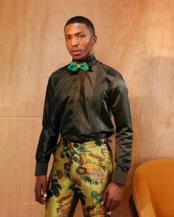 A Silk, dark seaweed green, pleated tuxedo shirt.