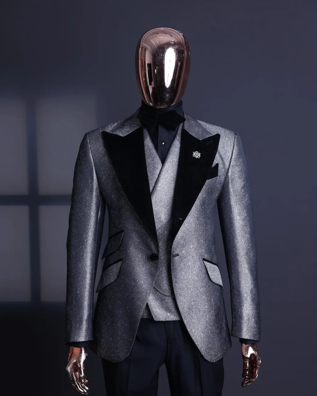 A Silver and black, knitted, jacquard peak lapel tuxedo suit