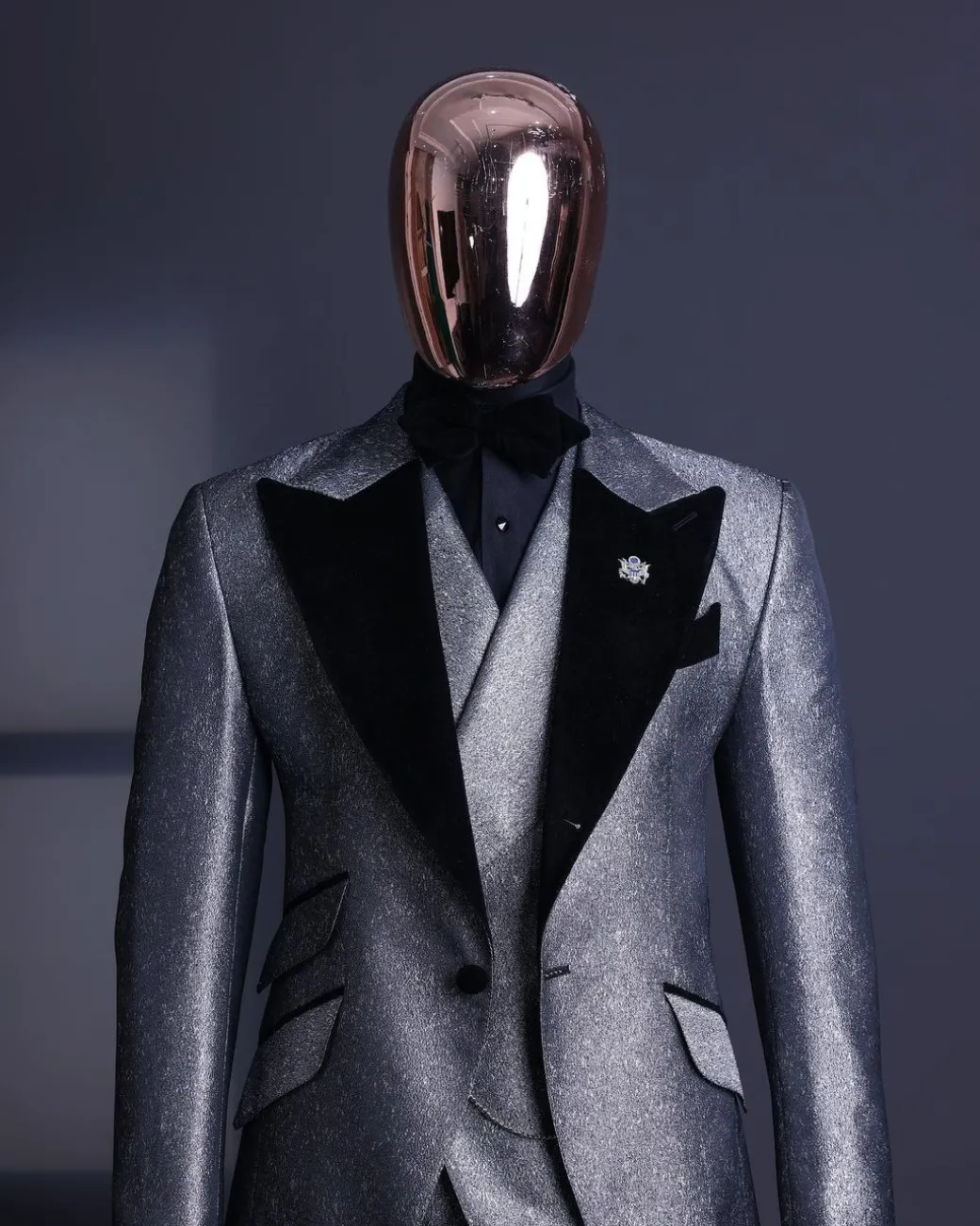 A Silver and black, knitted, jacquard peak lapel tuxedo suit