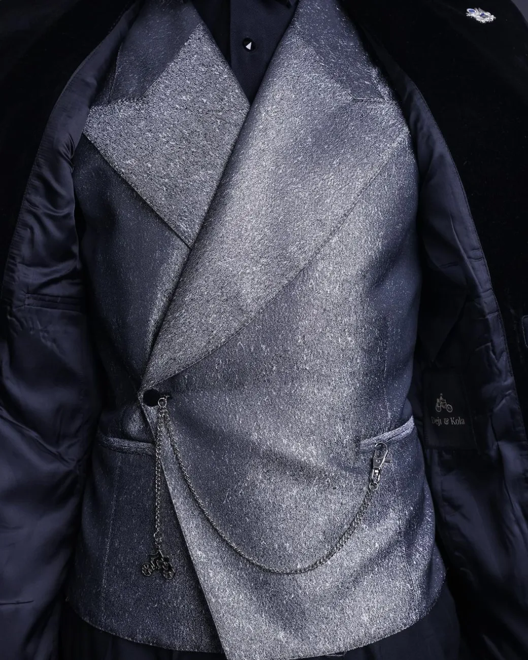 A Silver and black, knitted, jacquard peak lapel tuxedo suit