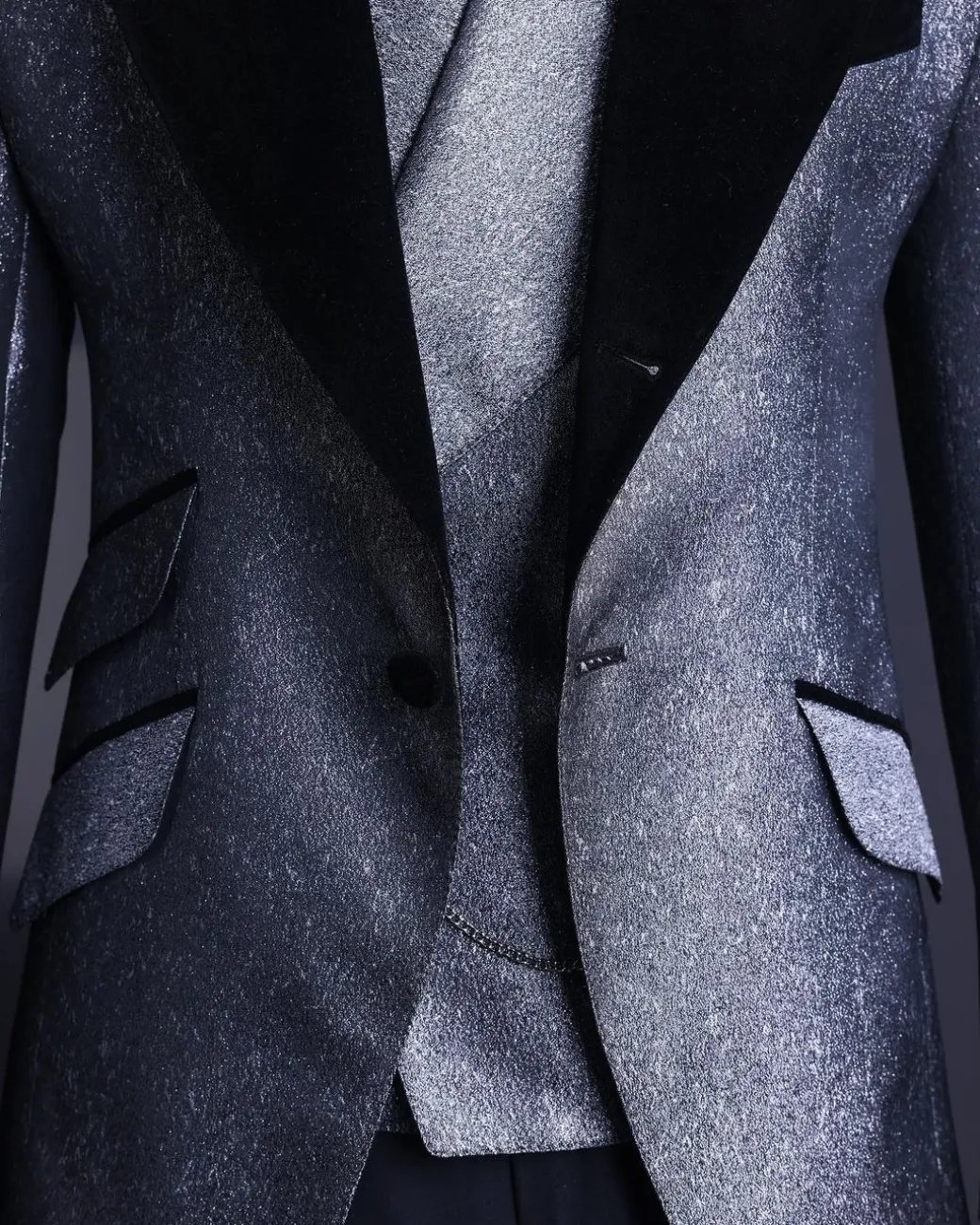 A Silver and black, knitted, jacquard peak lapel tuxedo suit
