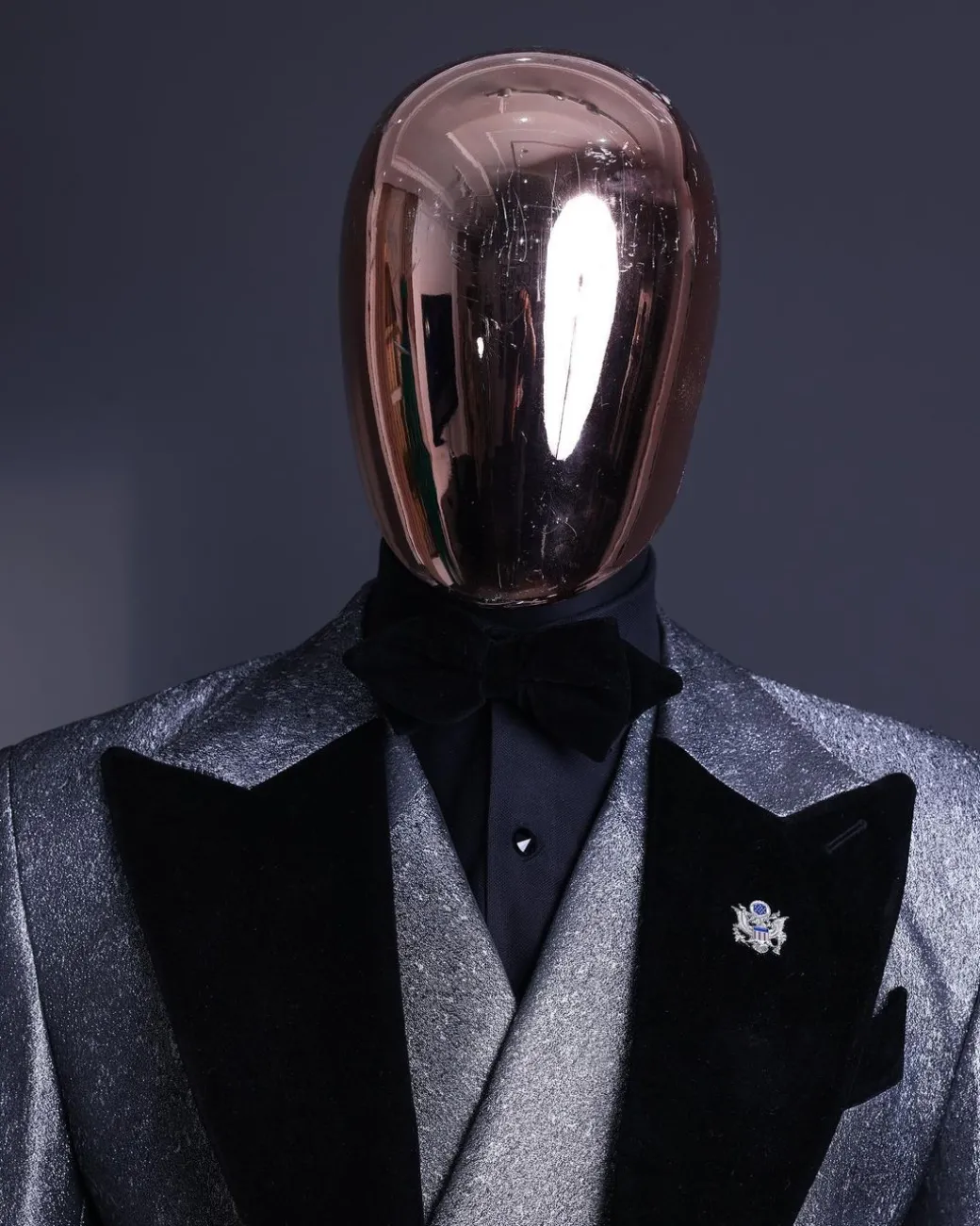 A Silver and black, knitted, jacquard peak lapel tuxedo suit