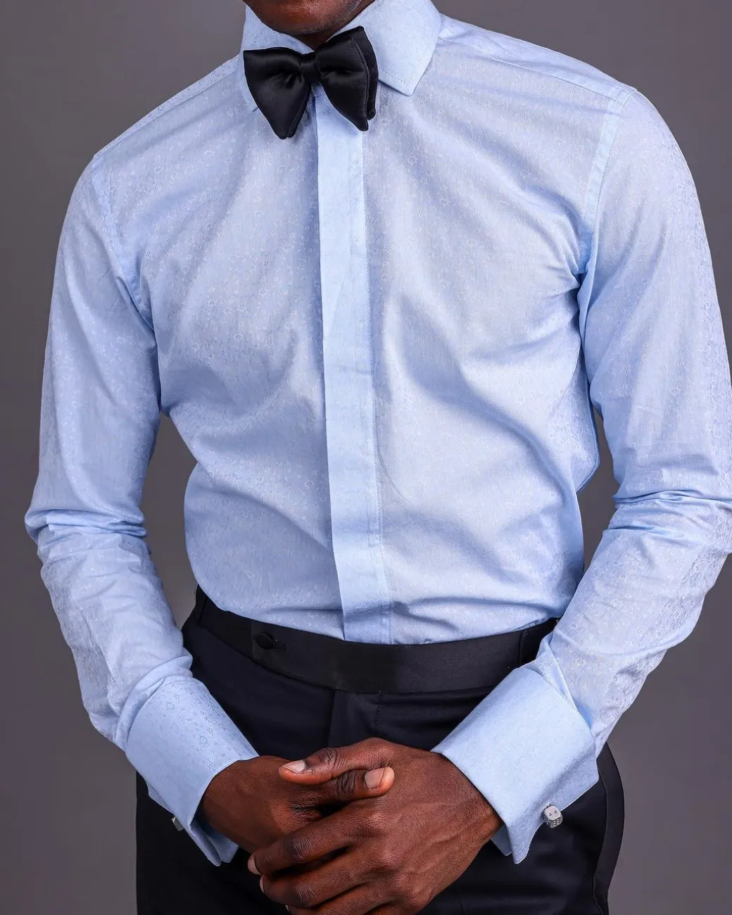 A Sky Blue, Covered Button, Connected Paisley Print Tuxedo Shirt.
