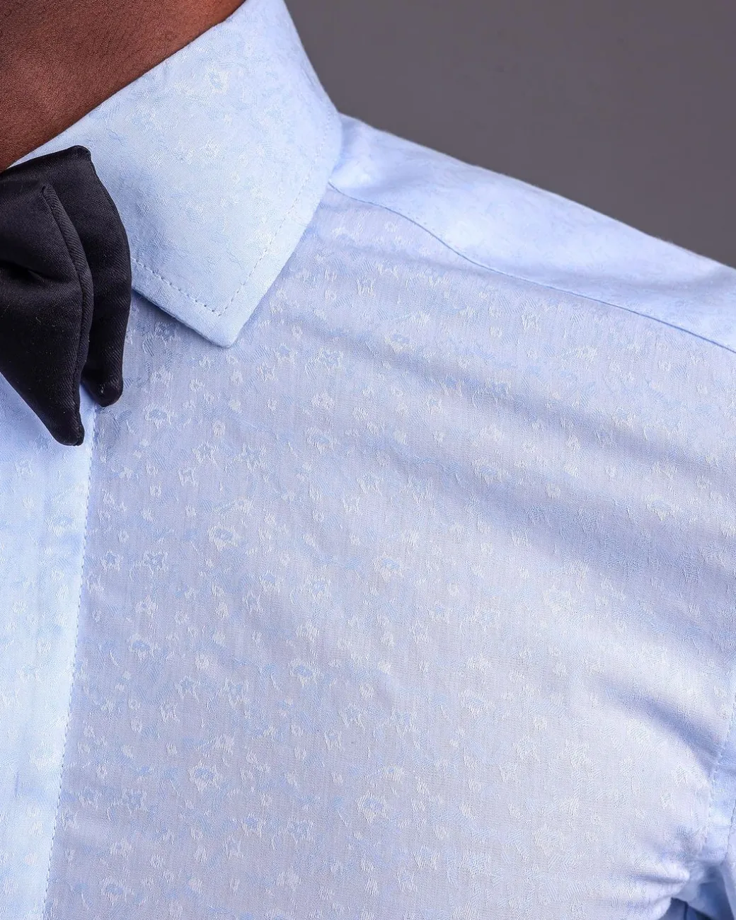 A Sky Blue, Covered Button, Connected Paisley Print Tuxedo Shirt.