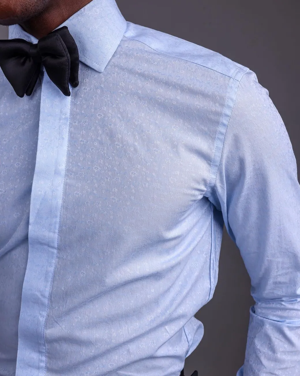 A Sky Blue, Covered Button, Connected Paisley Print Tuxedo Shirt.