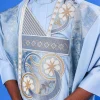 A sky blue galactical embroidery with gold and blue print jacquard details agbada