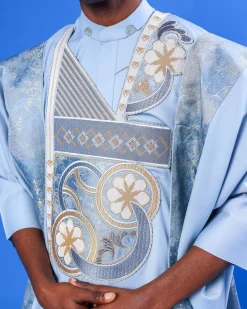 A sky blue galactical embroidery with gold and blue print jacquard details agbada