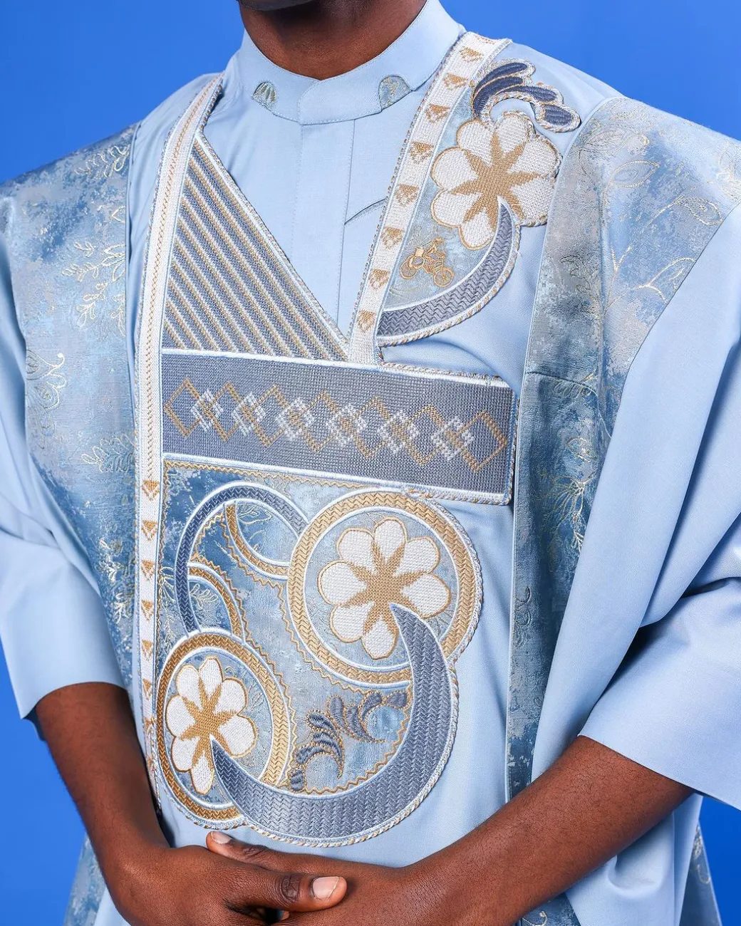 A sky blue galactical embroidery with gold and blue print jacquard details agbada