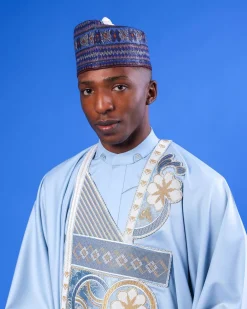 A sky blue galactical embroidery with gold and blue print jacquard details agbada