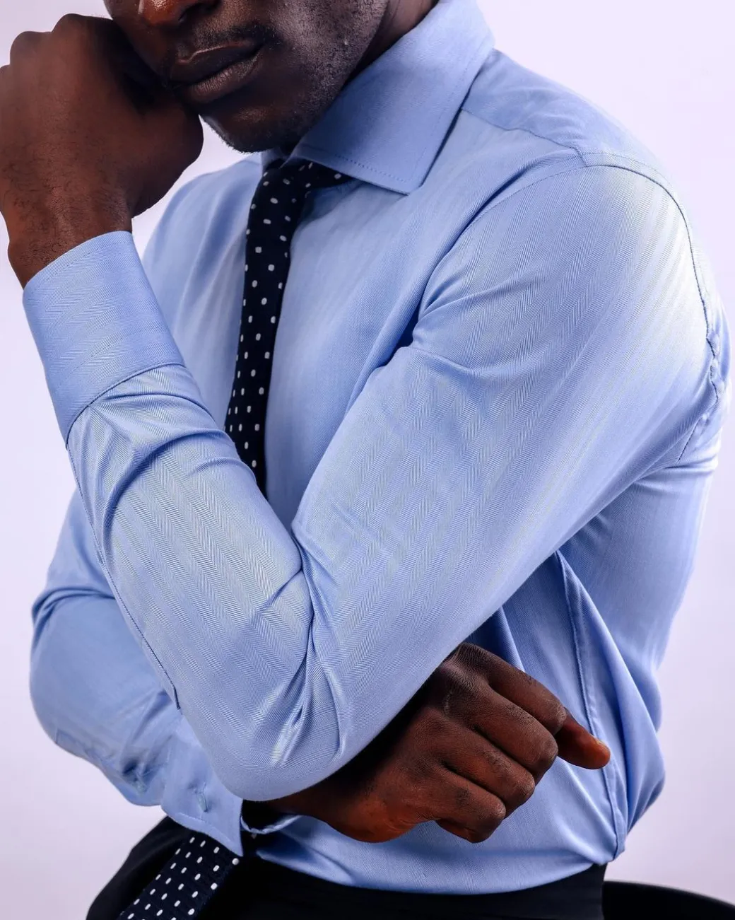 A Skye blue, herringbone fabric, cut away collar business shirt.