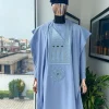 A Skye Blue Tuatara-eyed Embroidery Design with Silver Swarovski with Soaked Detailing Agbada