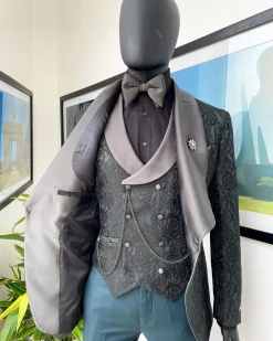 A “spirogyra” patterned, phthalo green shawl lapel metallic jacquard suit