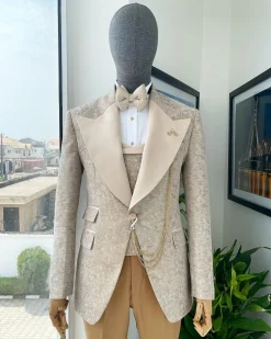 A splash of tortilla and wheat brown peak lapel metallic jacquard tuxedo suit