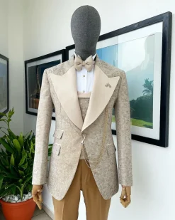 A splash of tortilla and wheat brown peak lapel metallic jacquard tuxedo suit