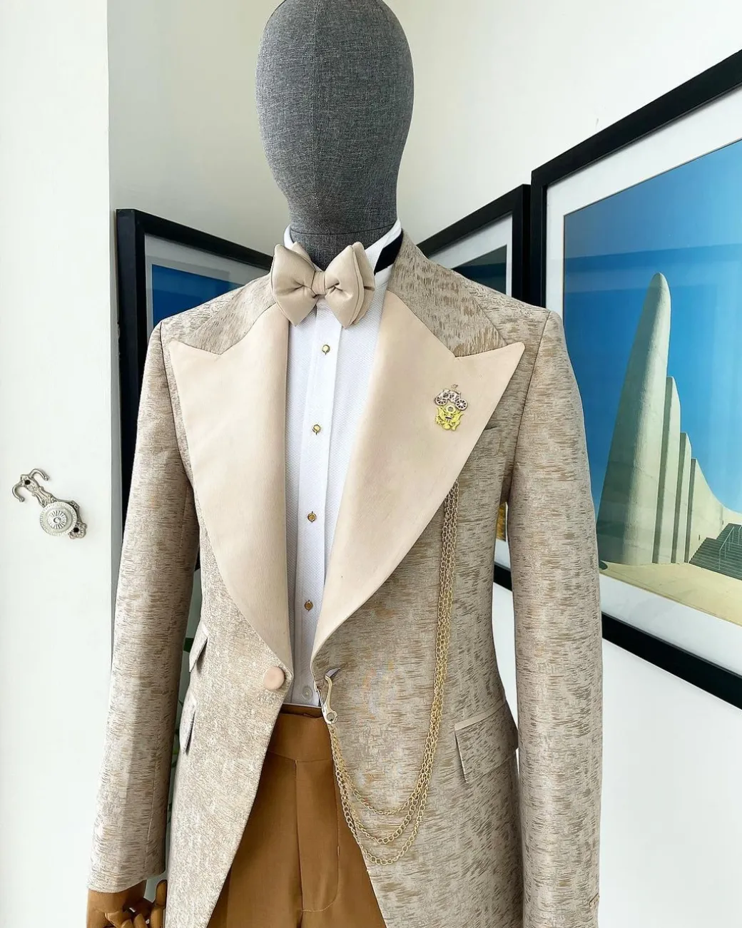 A splash of tortilla and wheat brown peak lapel metallic jacquard tuxedo suit
