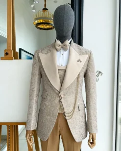 A splash of tortilla and wheat brown peak lapel metallic jacquard tuxedo suit