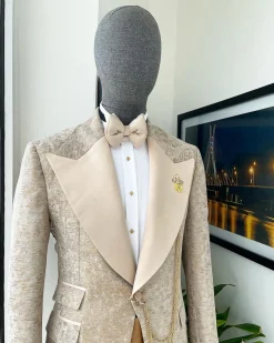 A splash of tortilla and wheat brown peak lapel metallic jacquard tuxedo suit