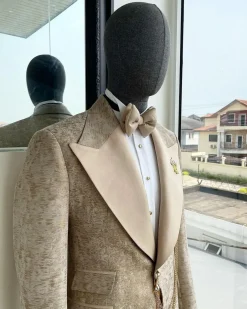A splash of tortilla and wheat brown peak lapel metallic jacquard tuxedo suit