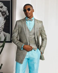 A Splashed gold & turquoise blue metallic jacquard double-breasted suit