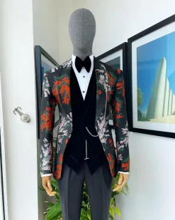 A “spring” orange, pink and green splashed floral layered front cut, shawl lapel tuxedo suit