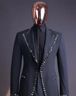 A steel black, seer sucker fabric, knitted, peak lapel suit