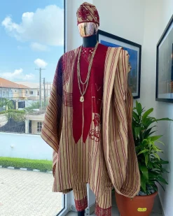 A Stripe champagne gold, cream, burgundy, aso oke regal agbada