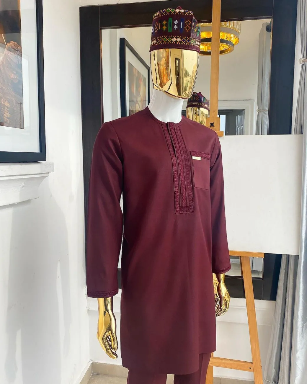 A “Suktan” rose wood burgundy, embroidery patch pocket and front flap, free suit hand sleeve details, African traditional senator native