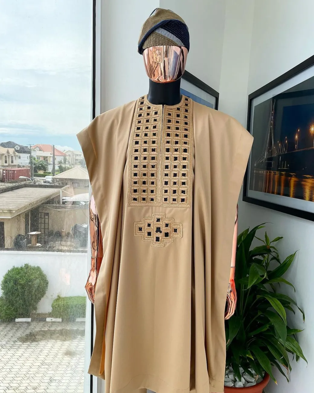 A Tan Brown, Connected Square Embroidery Design with Black Detailing Agbada