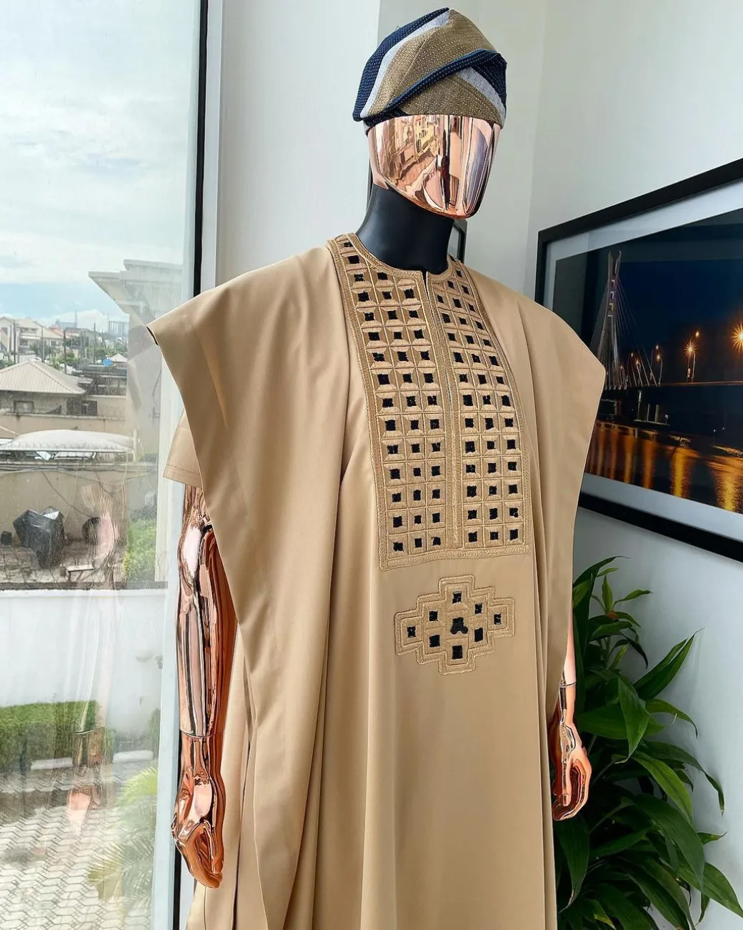 A Tan Brown, Connected Square Embroidery Design with Black Detailing Agbada