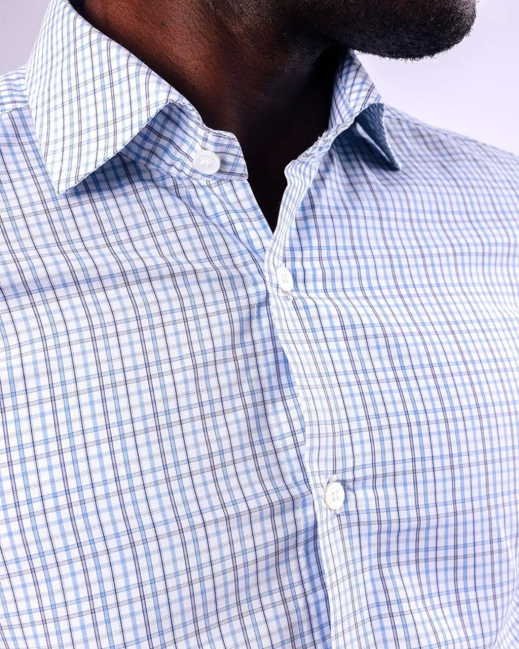 A Tattersall white, grey and light blue check, English spread collar business shirt