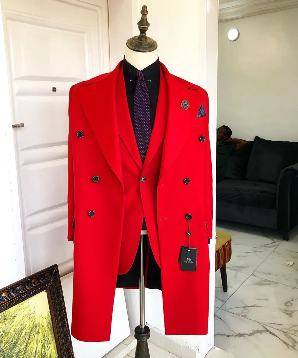 A Tomato Red “Battle Of Dahomey” Notch Lapel Trench Suit