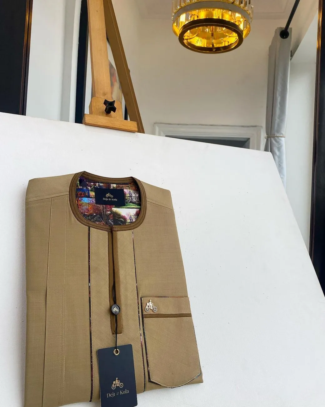 A Tortilla and brunette brown mix, patch pocket, and zipline flap detail African traditional senator kaftan native