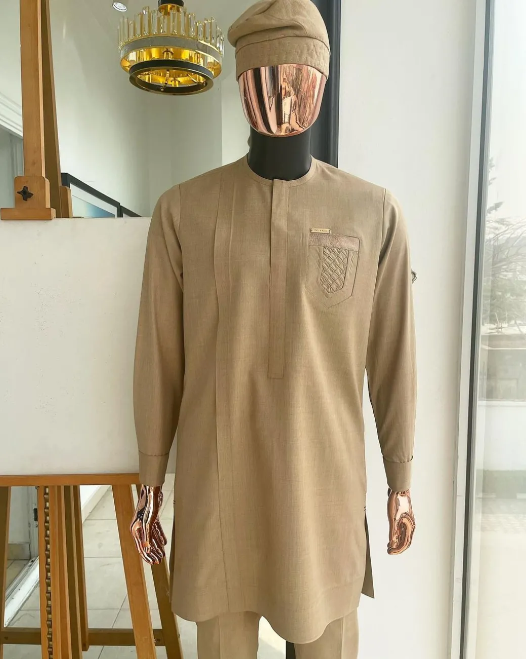 A tortilla brown, front flap, and ruffle pocket detail African traditional senator kaftan native