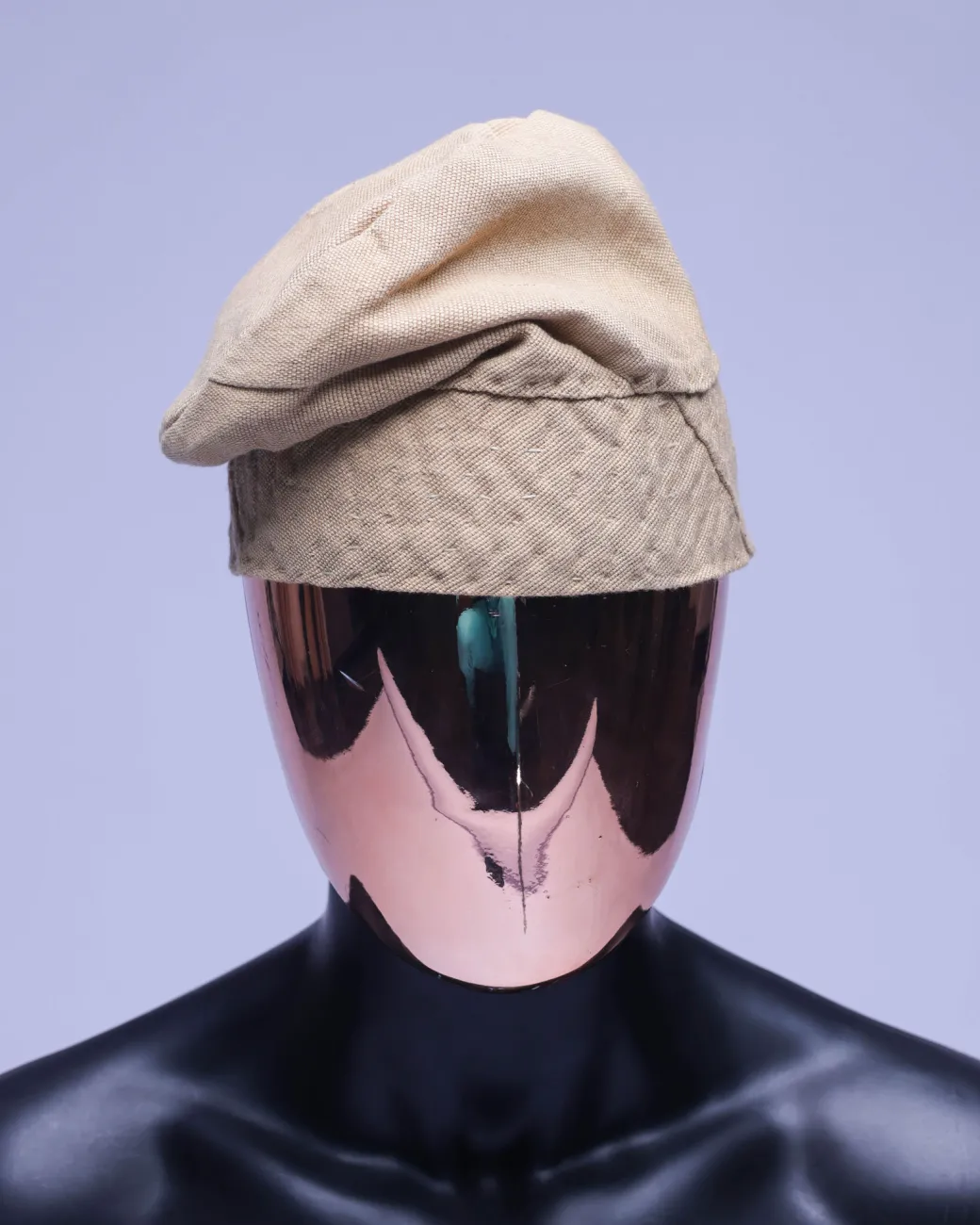 A Tortilla brown Yoruba traditional hat/Fila.