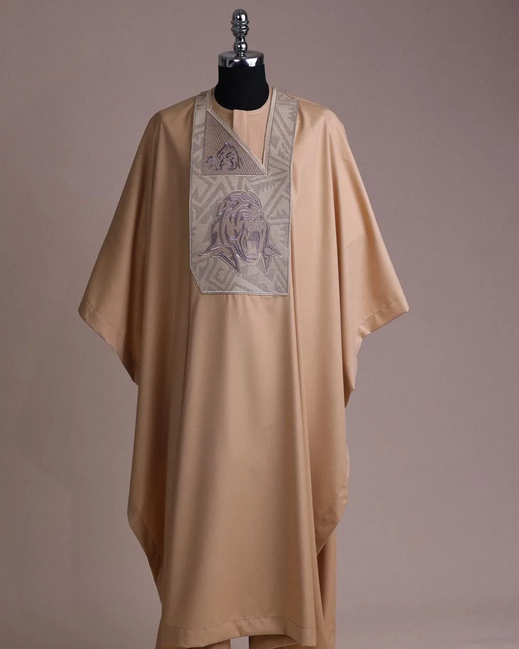 A Tortilla town, roaring godzilla metallic wire embroidery details Agbada