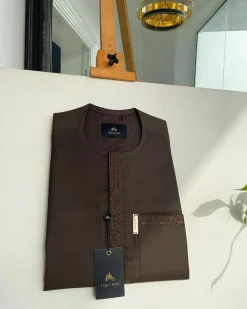 A Umber brown, rectangle lanes and dotted front flap and pocket embroidery detailing African traditional senator kaftan native.