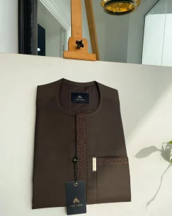 A Umber brown, rectangle lanes and dotted front flap and pocket embroidery detailing African traditional senator kaftan native.