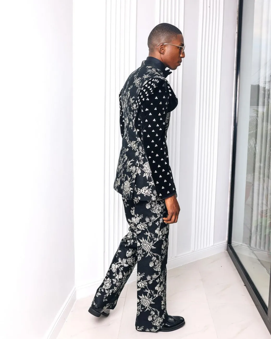 A “Vegas 2”, Floral pattern jacquard, Elevated shoulder and sleeve with Swarovski details peak Lapel tux suit