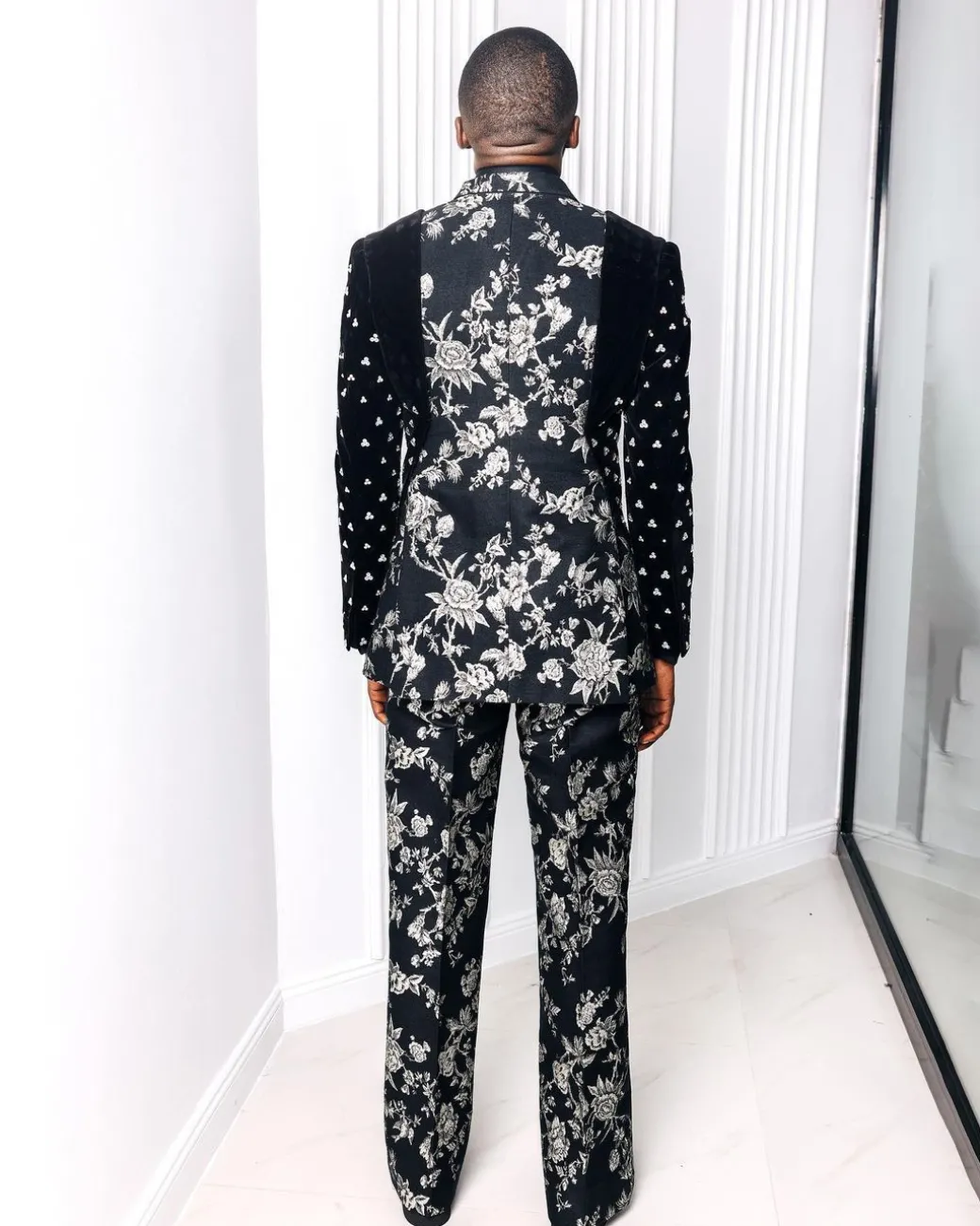 A “Vegas 1”, Floral pattern jacquard, shoulder wrap and sleeve with Swarovski peak Lapel tux suit