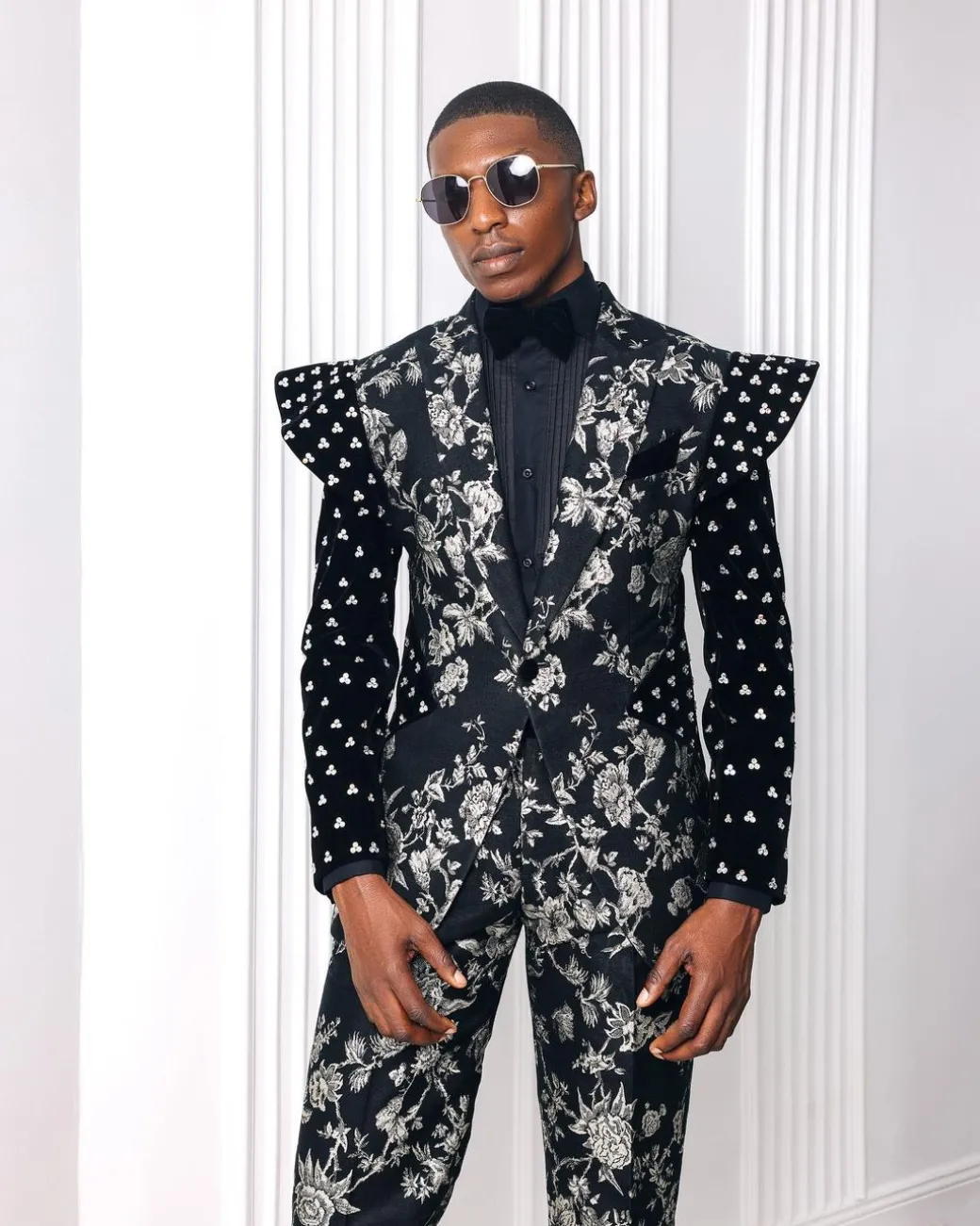 A “Vegas 2”, Floral pattern jacquard, Elevated shoulder and sleeve with Swarovski details peak Lapel tux suit