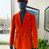 A vermillion Orange, soaked Italian velvet, double breasted, Lower Cut suit